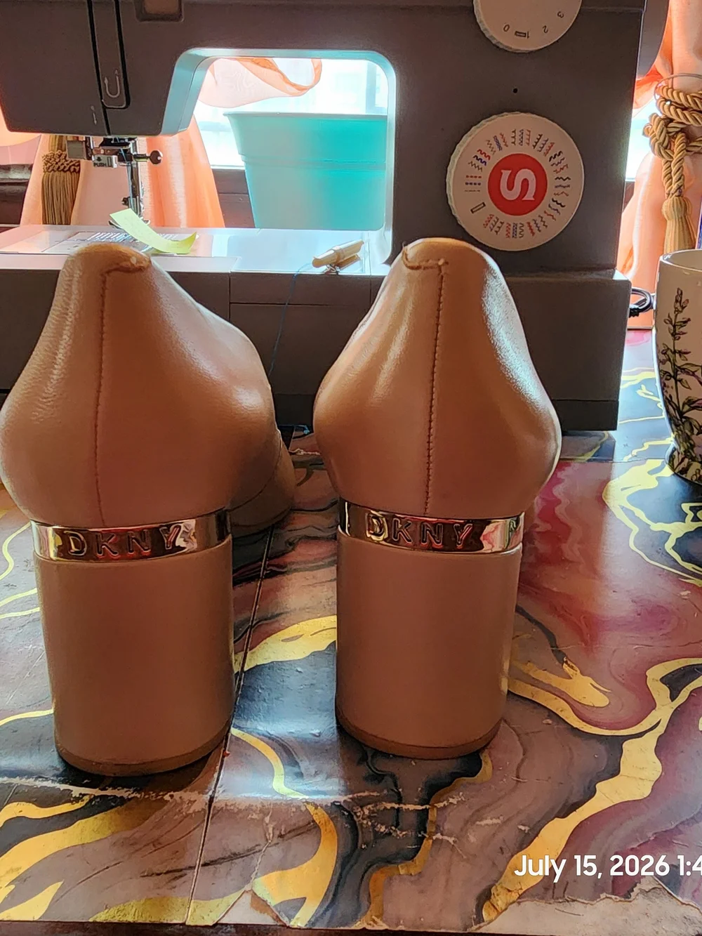 DKNY Tan Block Heel Pumps with Gold M Metal Plate Trim Logo Band
